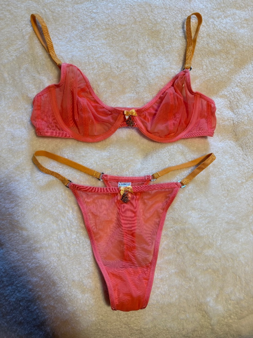 Lounge, hot pink mesh bra and thong